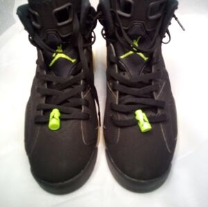 Black Sneakers with Neon Green Accents